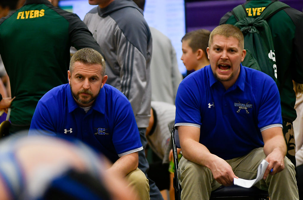 Capital City head wrestling coach Mitchell Werdehausen yells to one of his wrestlers